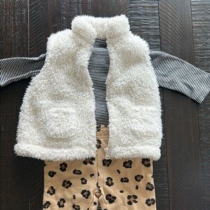 Furry vest with striped onesie and leopard print leggings
